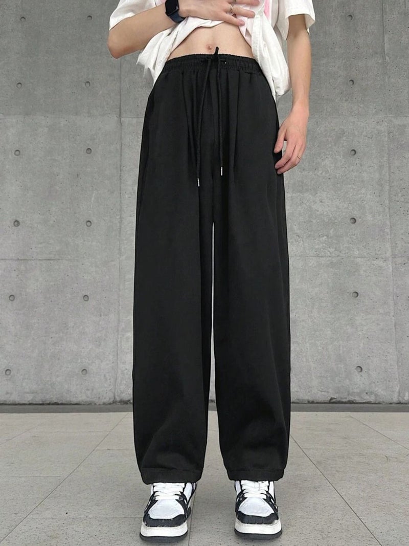 FLYNOFF Black Korean Look Loose Fit Men's Track Pant - Image 1